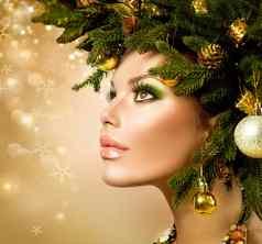圣诞节女人圣诞节树假期发型化妆