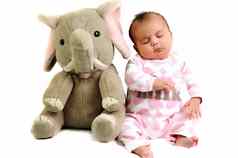 婴儿女孩坐着睡觉大象玩具
