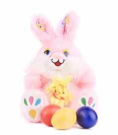 粉红色的玩具兔子复活节鸡蛋