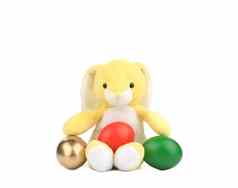 黄色的玩具兔子复活节鸡蛋