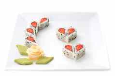 寿司形成心花形状白色广场菜