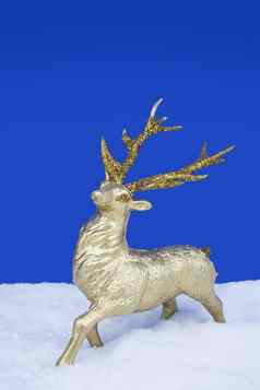 黄金驯鹿圣诞节点缀站假的雪