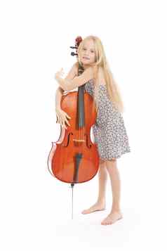 年轻的女孩衣服拥抱大提琴