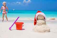 桑迪雪人红色的圣诞老人他白色加勒比海滩