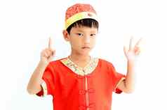 中国男孩传统的中国人红色的唐西装问候