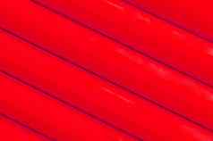 红色的塑料油管模式纹理背景