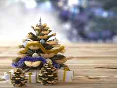 圣诞节锥礼物木纹理概念假期背景