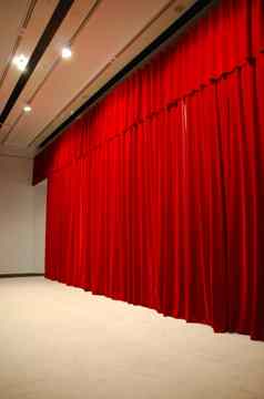 红色的挂剧院阶段窗帘灯