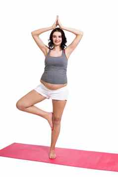 活跃的年轻的怀孕了女人瑜伽