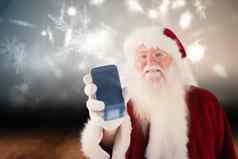 复合图像圣诞老人老人显示智能手机