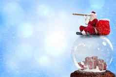 复合图像圣诞老人坐着雪全球