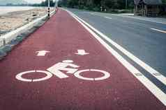 自行车车道路径图标象征红色的沥青路