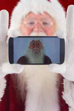 复合图像圣诞老人记录智能手机