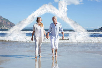 复合图像快乐夫妇走光着脚海滩