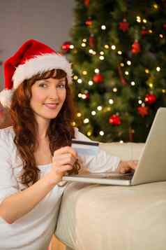 红色头发的人购物在线移动PC圣诞节