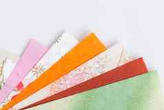 摘要色彩斑斓的折纸纸模式纹理堆放层