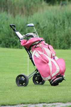 粉红色的高尔夫球包高尔夫俱乐部