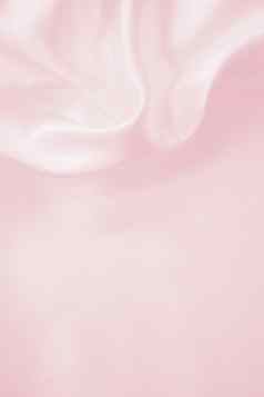 光滑的优雅的粉红色的丝绸婚礼背景