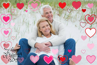 复合图像浪漫的高级夫妇放松海滩