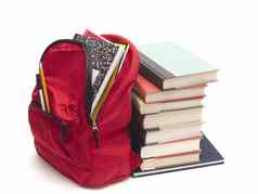 红色的背包堆栈教科书白色