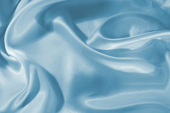 光滑的优雅的蓝色的丝绸缎背景