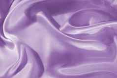 光滑的优雅的淡紫色丝绸缎背景