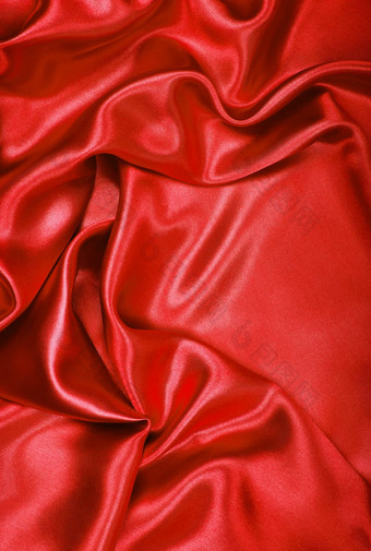 光滑的优雅的红色的丝绸缎背景