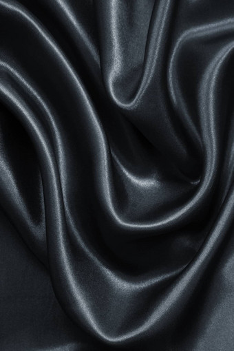 光滑的优雅的黑暗灰色丝绸缎背景