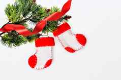圣诞老人的靴子圣诞节树红色的丝带