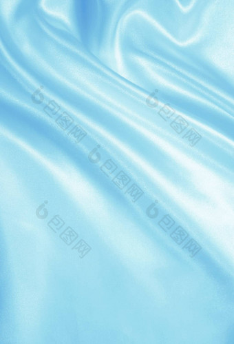 光滑的优雅的蓝色的丝绸缎背景