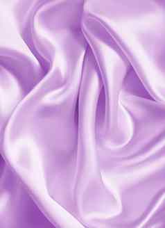 光滑的优雅的淡紫色丝绸缎纹理背景
