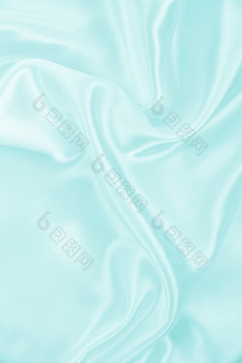 光滑的优雅的蓝色的丝绸缎纹理背景