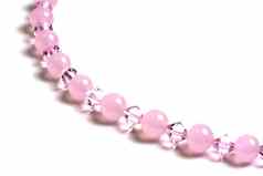 美丽的粉红色的字符串珠子