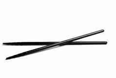 黑色的筷子孤立的白色