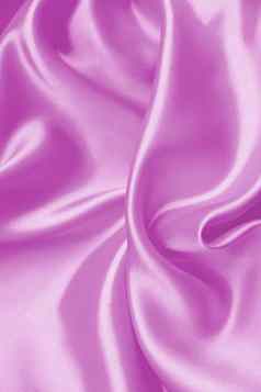 光滑的优雅的淡紫色丝绸缎纹理背景
