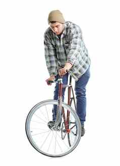 年轻的男人。技巧固定齿轮自行车白色