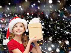 微笑女孩圣诞老人助手他礼物盒子