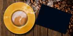 复合图像黄色的杯咖啡
