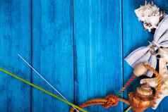夏天假期蓝色的背景空间广告海上主题贝壳海星海结锚弓领带