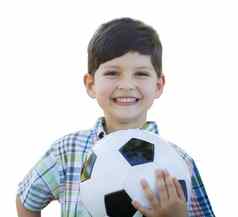 可爱的年轻的男孩持有足球球孤立的白色