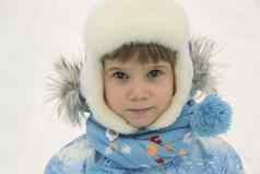 冬天肖像可爱的孩子女孩温暖的衣服