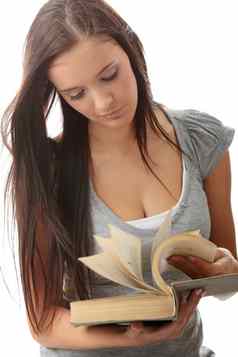 年轻的青少年学生女人阅读书