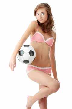 年轻的女人足球球