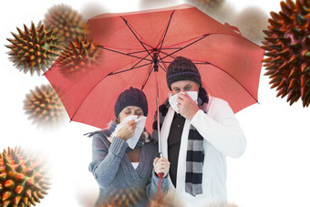复合图像成熟的夫妇吹鼻子伞