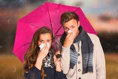 复合图像夫妇吹鼻子持有伞