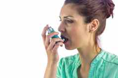 女人哮喘吸入器