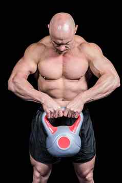 肌肉发达的适合男人。提升壶铃