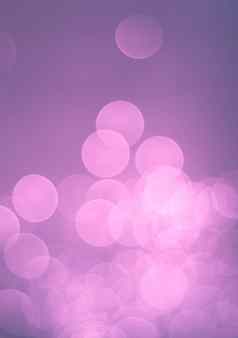 粉红色的紫罗兰色的散景光背景