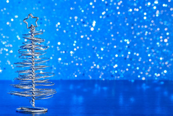 金属现代圣诞节树木表格蓝色的色彩<strong>光</strong>散景背景