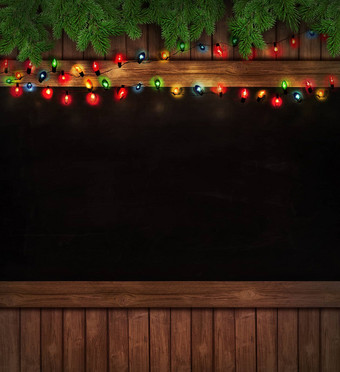 圣诞节灯木黑板上